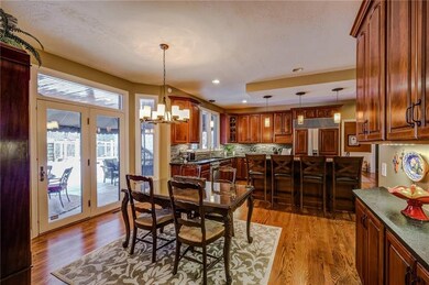 Cabinets and Leathered Granite Counters wrap aroun