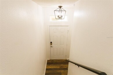 View of the front door from upstairs.