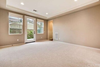 Formal Living Room with a coffered ceiling and Fre