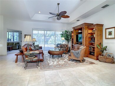 Great room with tray ceiling, pool and preserve vi