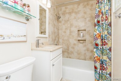 Relax in this professionally remodeled bathroom.