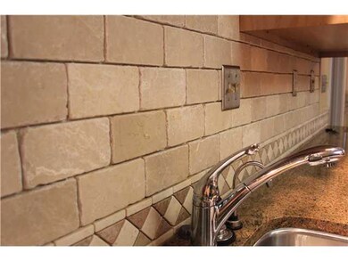 Beautiful Tile Backsplash & Granite Tops with Unde