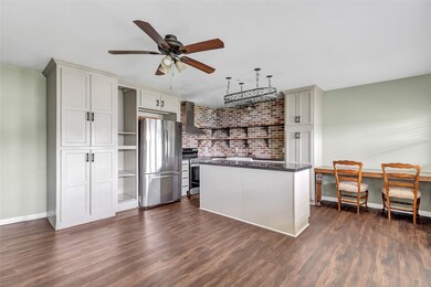 This kitchen features modern appliances, a stylish