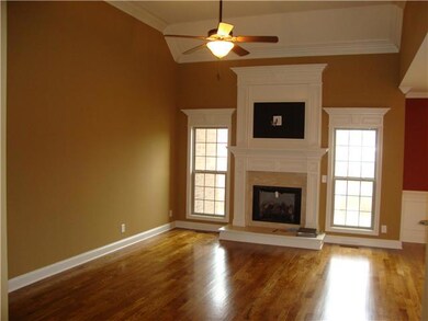 Great Formal Living Rm with Hardwood Floors and Fireplace.   