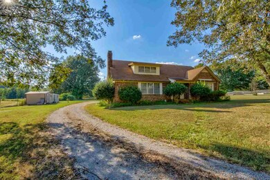Welcome home to this charming brick home situated 
