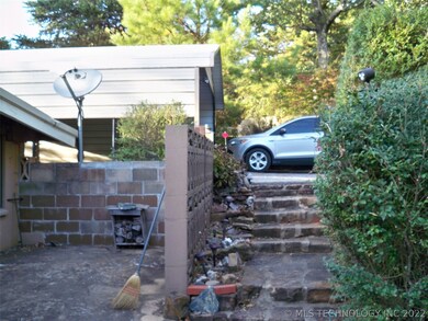 Carport parking at the back of the home (east side