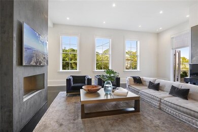 Soaring 14ft. ceilings oversized windows bath all