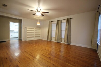 Unfurnished room with ceiling fan, hardwood / woo