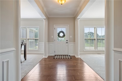 Pretty and bright entry with both dining room and