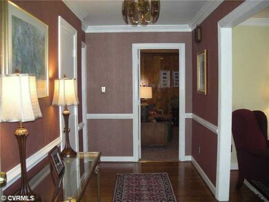 Foyer - Large foyer has hardwood floors & coat clo