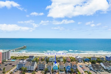 Exterior space featuring a view of the beach and a