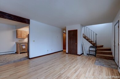 Living rm stairs & kitchen