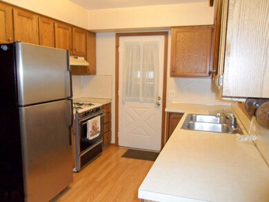 Kitchen with Stainless Refrigerator