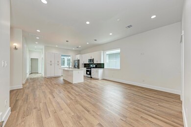 Unfurnished living room featuring light wood-styl