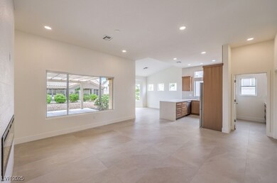 Unfurnished living room featuring recessed lightin