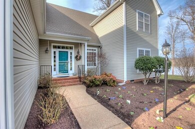 Aggregate sidewalk leading to front entrance.