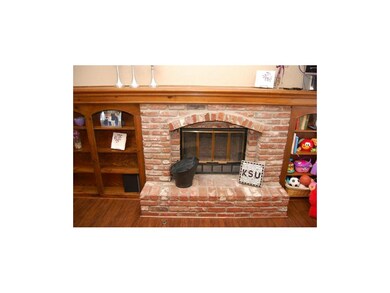 Cozy wood burning fireplace.