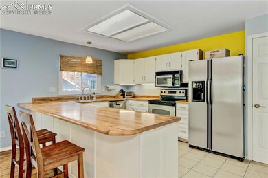 Kitchen with eat-in bar