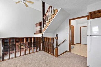 Kitchen Overlooks Family Room