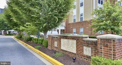 Residences of Fallsgrove unit 103, Rockville, MD 20850 - photo 2