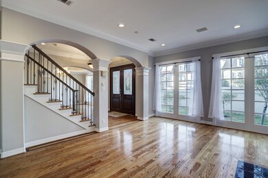 Once inside the beautiful Foyer, the attention to detail is instantly noticed thru out the residence! Extensive crown molding and base boards, authentic Oak hardwood floors, decorative lighting, soaring ceilings, arched entries and more, freshly painted and ready more move in!