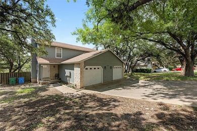 View of front of property featuring a shingled ro