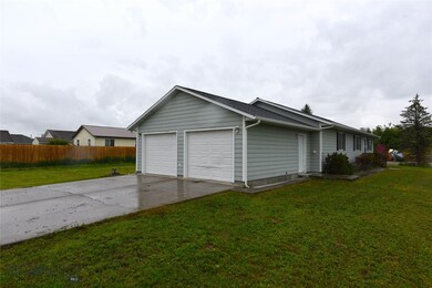 Large alley loaded two car garage with ample room