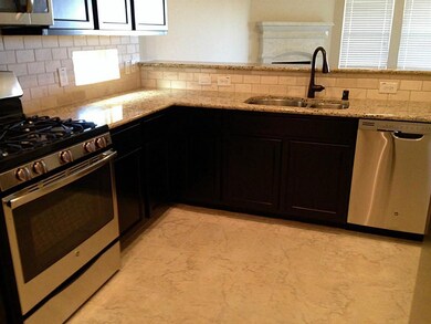 Owner upgraded kitchen package, granite counter tops, custom cabinets, stainless steel appliances.