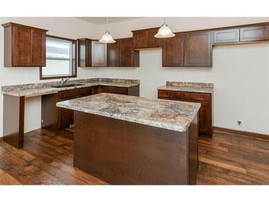 Kitchen with Breakfast Bar and Crown Molding
