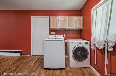 Laundry area off the kitchen, door to garage