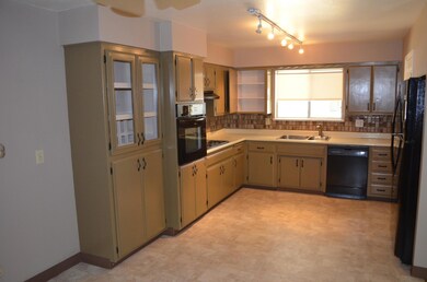 Kitchen with black appliances