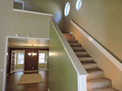 Stairway and formal dining