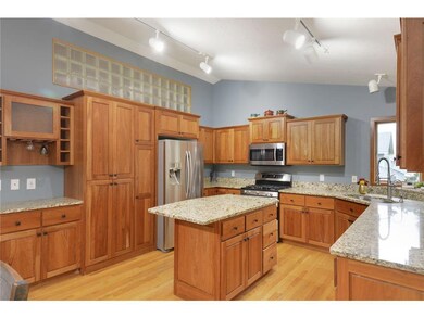 Vaulted ceilings and glass block accents provide a