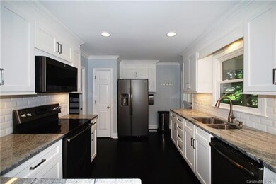 Kitchen ( View 2). GE Stainless Appliances, Tier 3