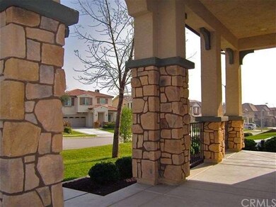 Covered porch, attractive stone accents