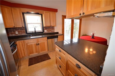Terrific eat-in kitchen with hickory soft close ca
