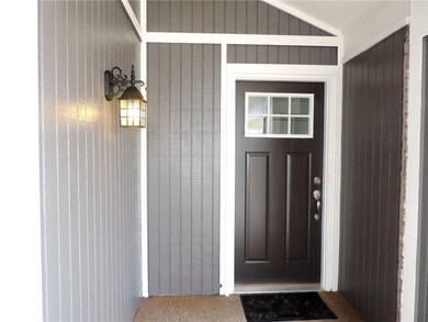 Craftsman style front door and fixtures.