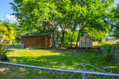 View of yard with a shed