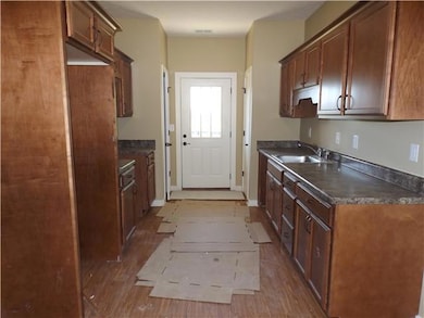 Pardon our dust!  This fabulous kitchen is almost complete! Upgraded cabinet design and hardware!