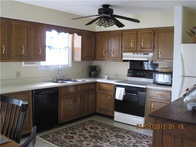 GREAT KITCHEN  WITH LOTS OF CABINETS, OPEN TO A NICE DECK....