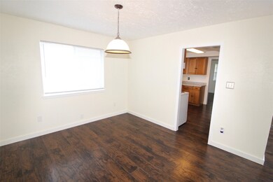 This study area is nestled just off the kitchen, a