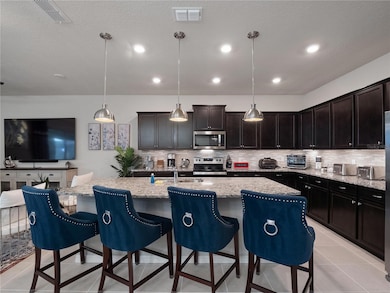 3225 Lilac Way, Davenport, FL 33897 - photo 7