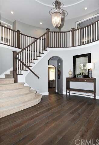 Impressive entry features new engineered wood floo