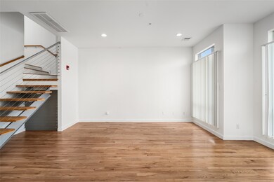Bright and airy living area with expansive floor-t
