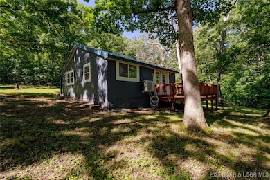 Lake view cabin on approximately 1.2 acres totally