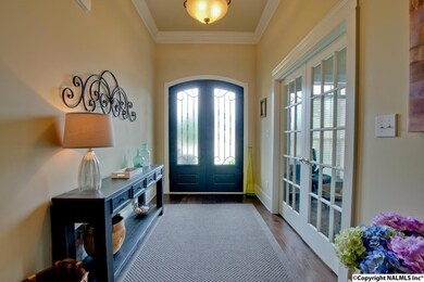 Double steel doors greet you as you enter the foyer.