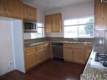 Kitchen with granite counters and SS appliances