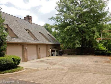 Exterior Front. Side view of 3 car garage