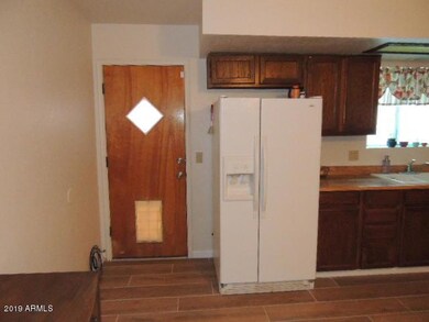 Kitchen w/Exit to Backyard