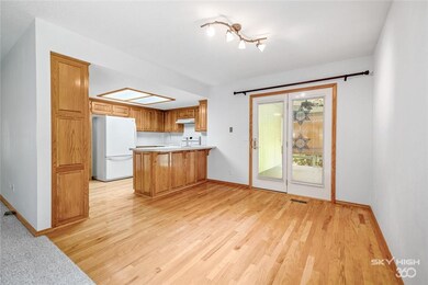 Eat-in kitchen with real hard wood floors